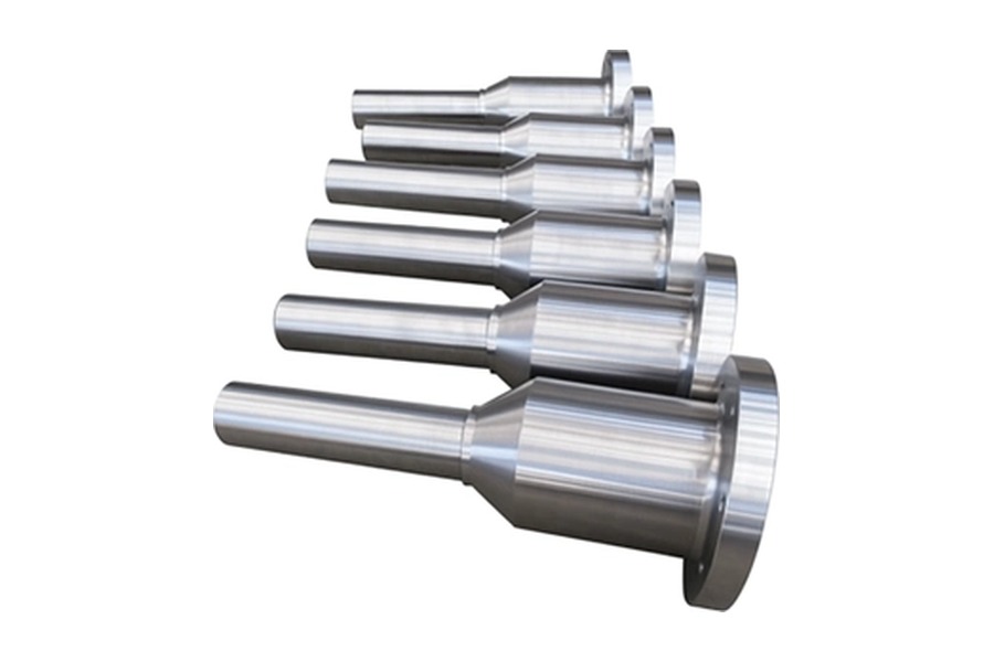 Flanged shafts with stepped journals and integral shoulders